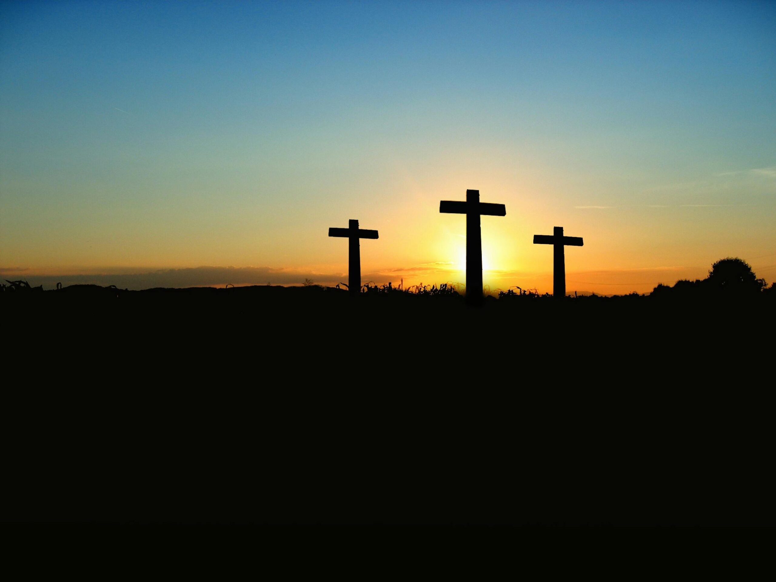 Three crosses at sunrise.